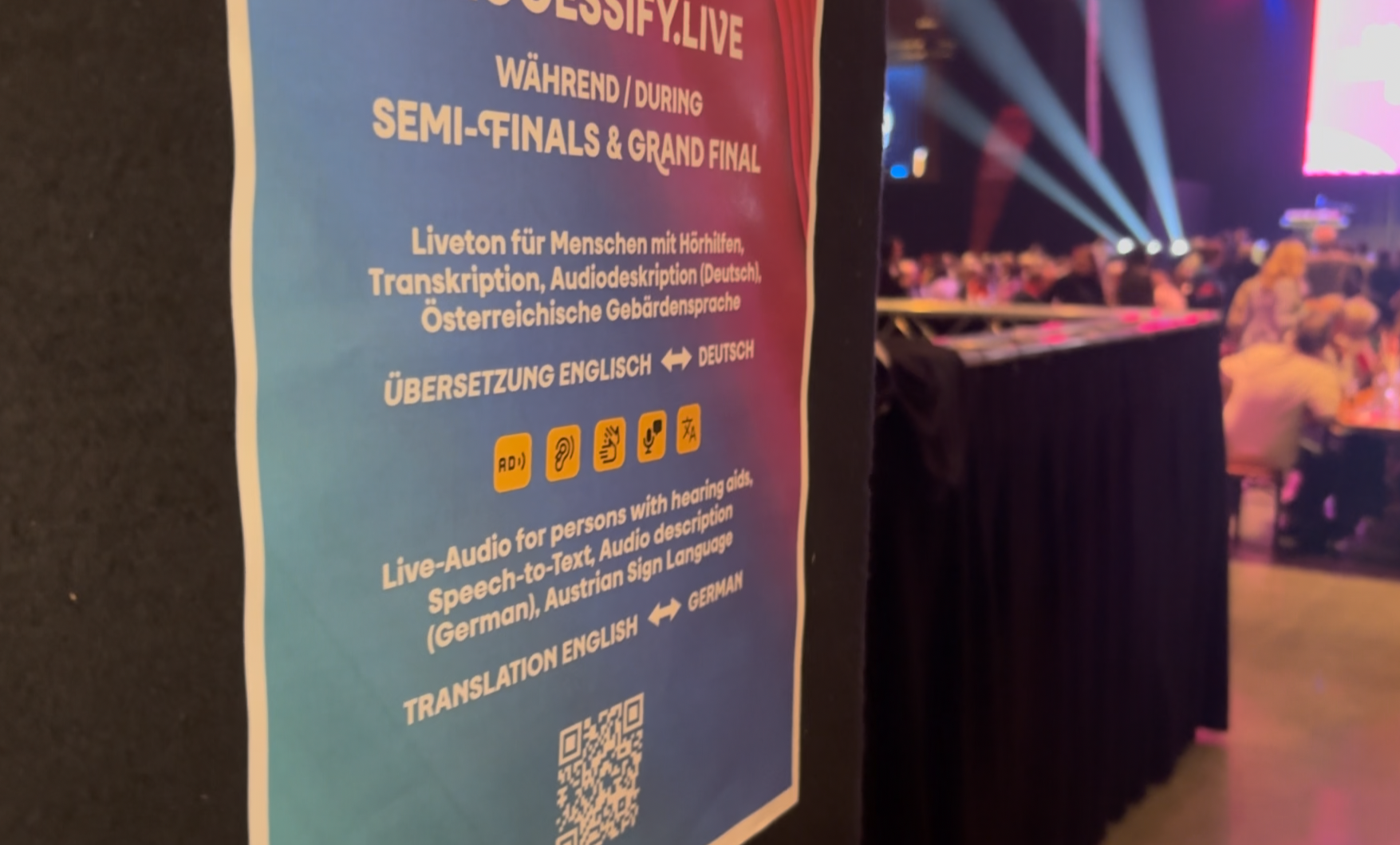 Accessify roll-up banner showing accessibility services for the Semi-Finals and Grand Final at a Eurovision public viewing in Austria